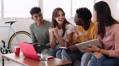 Multiethnic Group of College Student Studying Together Preparing for Exams