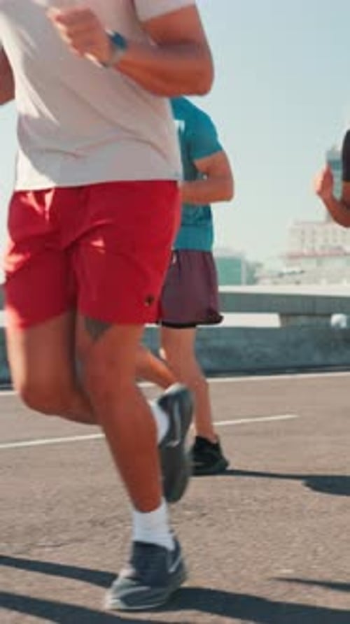 City, friends and legs for exercise, wellness challenge and training for marathon on bridge