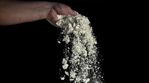 Flour in the Hand of a Cook Filmed on a Highspeed Camera at 1000 Fps
