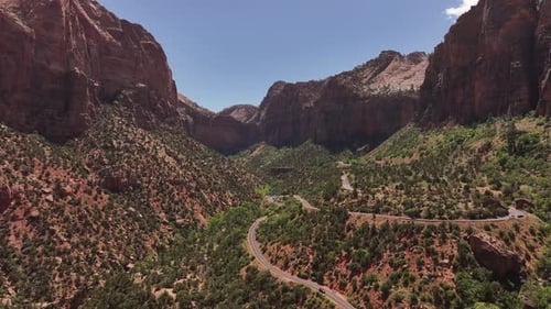 Beautiful serpentine road winding through a valley in the famous Zion National Park in Utah, United