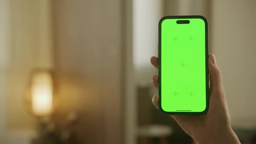 Green Screen Smartphone with Copy Space Hand Holding Chroma Key Phone