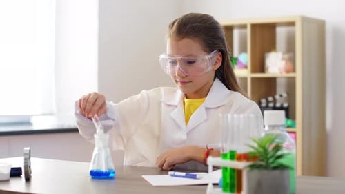 Young Girl Conducts a Science Experiment