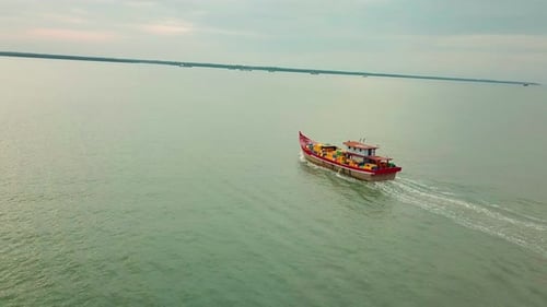 Sunset aerial view of Port Klang and a fishing boat