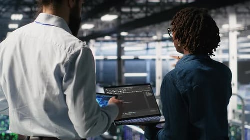 Data Center System Administrators Performing Maintenance on AI Supercomputers