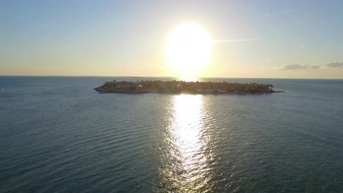 Sunset Behind Luxury Homes On Tropical Island