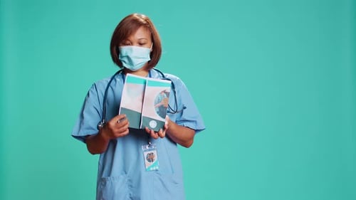 Nurse Presenting Medical Leaflet