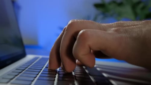Macro Shot of Person Typing on the Computer Keyboard Close Up Move View