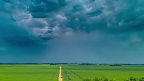 Formation of big massive storm clouds, dark grey blue, skyline time-lapse