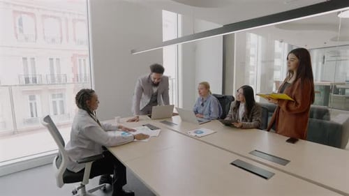 A Diverse Team Collaborating Effectively in a Modern Office That Inspires Innovation