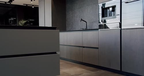 Minimalist Modern Kitchen Design with Gray Cabinetry