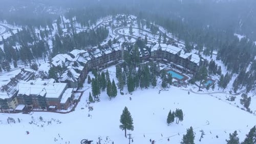 Aerial View of Luxury Mountain Ski Resort Hotel in Winter