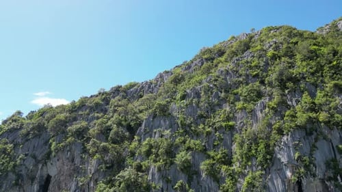 Vibrant blue sky accentuating metamorphic rocks at Baling hill