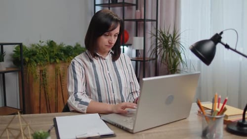 Young Woman Businesswoman Sitting at Home Office Closing Laptop Pc After Finishing Work Elearning