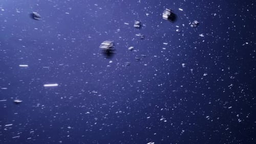 Asteroid Field Passing By In Vast Cosmic Darkness