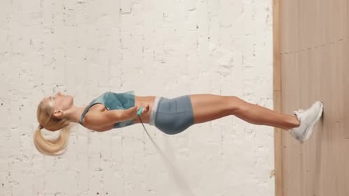 Woman Skipping Rope for Fitness Indoors