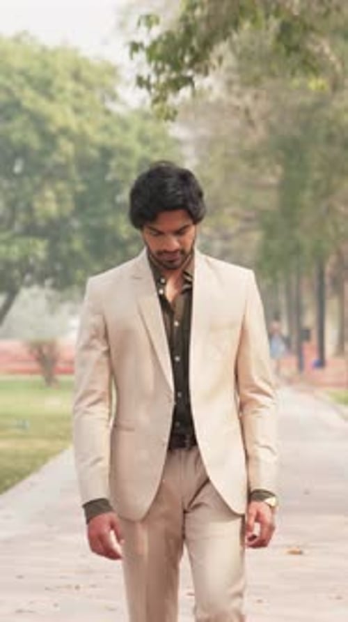 Vertical Shot of Indian Businessman Having Bad Day