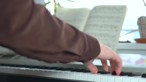 Close Up of Piano Player