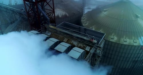 Aerial View of Grain Elevators and Steam