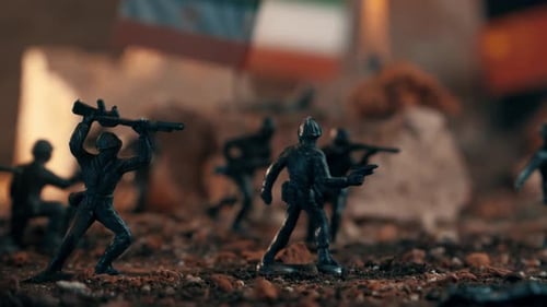 Miniature toy soldiers fighting in a geopolitical war diorama