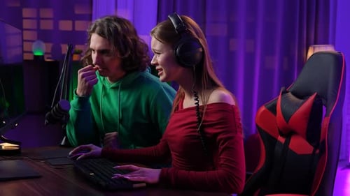 Frustrated Woman Gamer Reacts with Gaming Partner