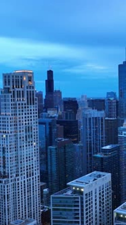 Panoramic view of Chicago colored blue. Amazing scenery of the city at dusk time