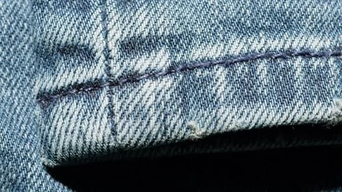 Detailed Close-Up of Woven Blue Denim Fabric
