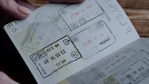 Close Up Shot of Person Identity Document Shot of Female Holding Ukrainian Passport and Flipping