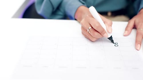 Hands, woman and writing for schedule planning, note calender or christmas reminder in office