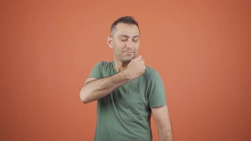 Man Moves Shoulders and Hand