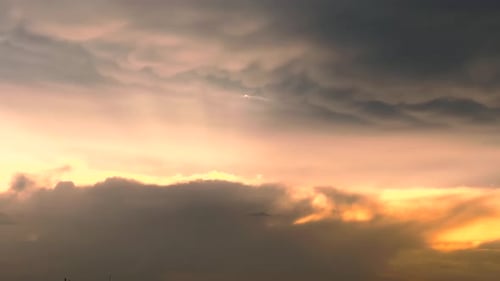 Dramatic Cloudy Sky At Sunset. close up, timelapse