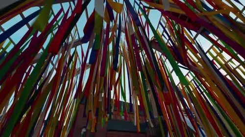 Colorful Ribbons Hanging with Building in Background