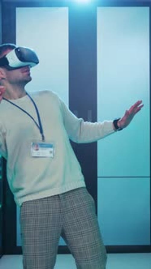 Man Using Virtual Reality Headset in a Workplace