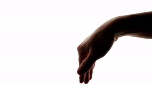 Gay hand symbol expressing not to worry non verbally on a white chroma key screen