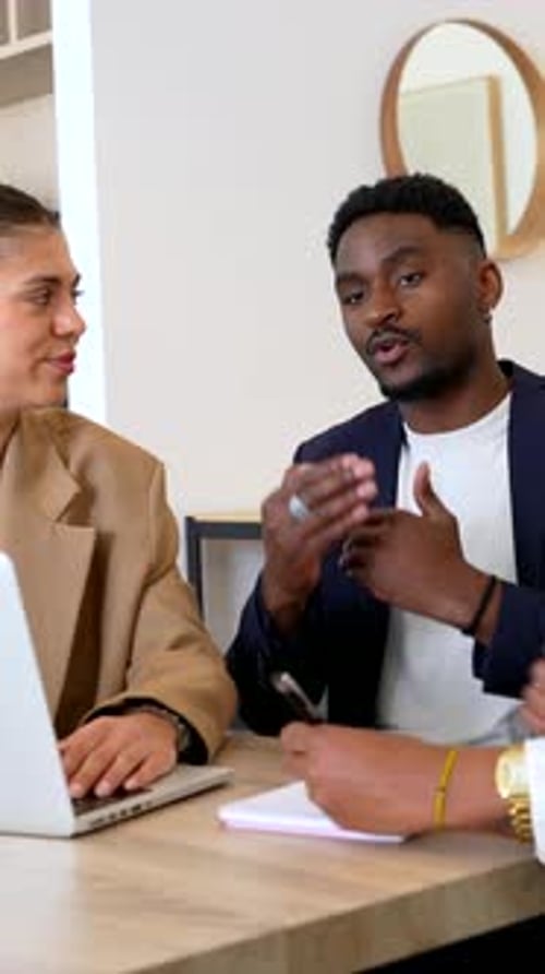 Business meeting, discussing strategy and collaboration in the office