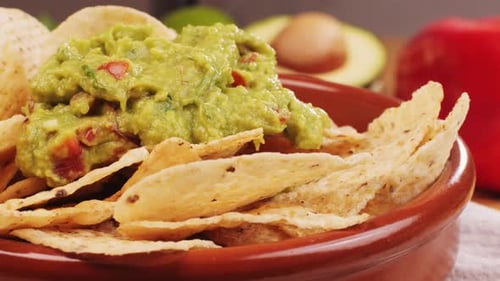 Nachos with Guacamole Dip Traditional Mexican Food in Restaurant for Nachos Close Up of Avocado