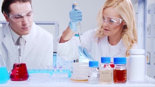 Medical Researchers Working in Bright Laboratory