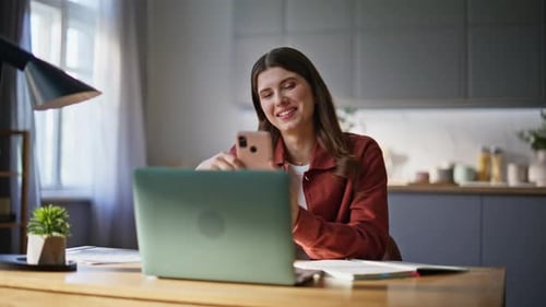 Relaxed Freelancer Messaging Online Looking Smartphone Screen in Office Closeup