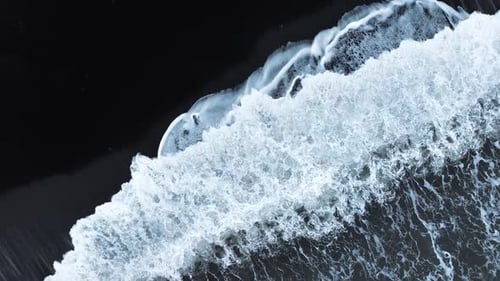 Black Sand Beach with Crashing Waves Serene and Tranquil Landscape Ocean Coast with Calm Waves