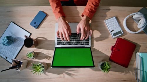 Hands Typing Mockup Laptop in Organized Workspace Overhead View Manager Working
