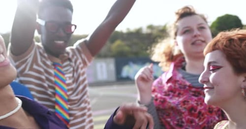 Happy Diverse Friends Dancing in Urban Setting