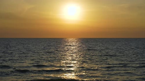 Ocean Sunset Big Yellow Sun on Dramatic Bright Sky Soft Evening Horizont Over Sea Dark Water