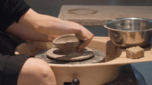 Unrecognizable Creative Artist Molding Clay On Pottery Wheel, Workshop Ceramic Studio. Slow Motion S