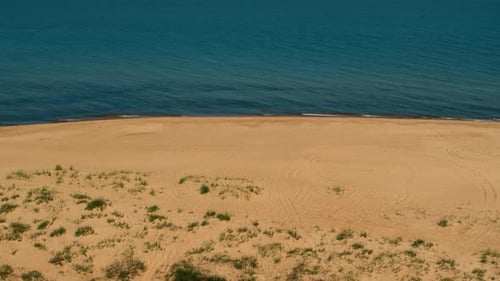 Aerial Sand Beach and Calm Sea Surface. Above Ocean Coastline. Drone