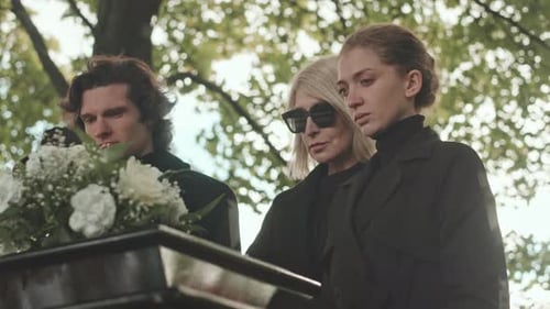 People Mourning and Grieving at Funerals