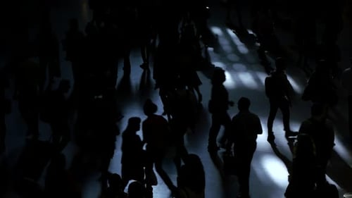 unrecognizable people walking on crowded street. city commuters scene