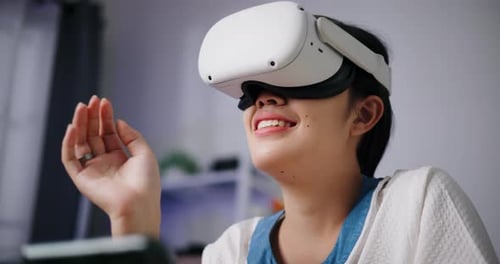 Woman Experiences Virtual Reality with VR Headset
