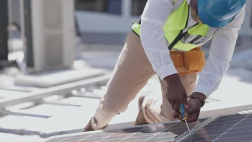 Engineer, solar panels installation and black man in construction, sustainability and natural