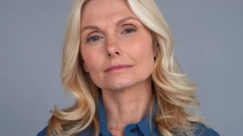 Confident Adult Age 50 Years Old Female Manager Portrait Looking at Camera