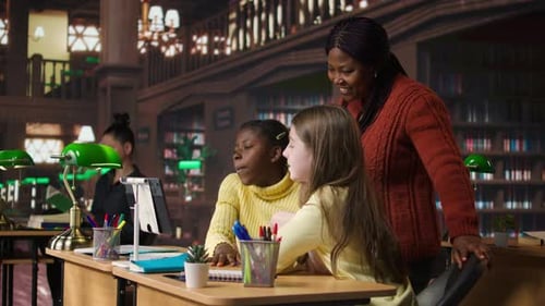 Elementary School Pupils and Tutor Attend a Live Online Course Lesson