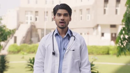 Young Doctor Explains Healthcare Advice Outdoors